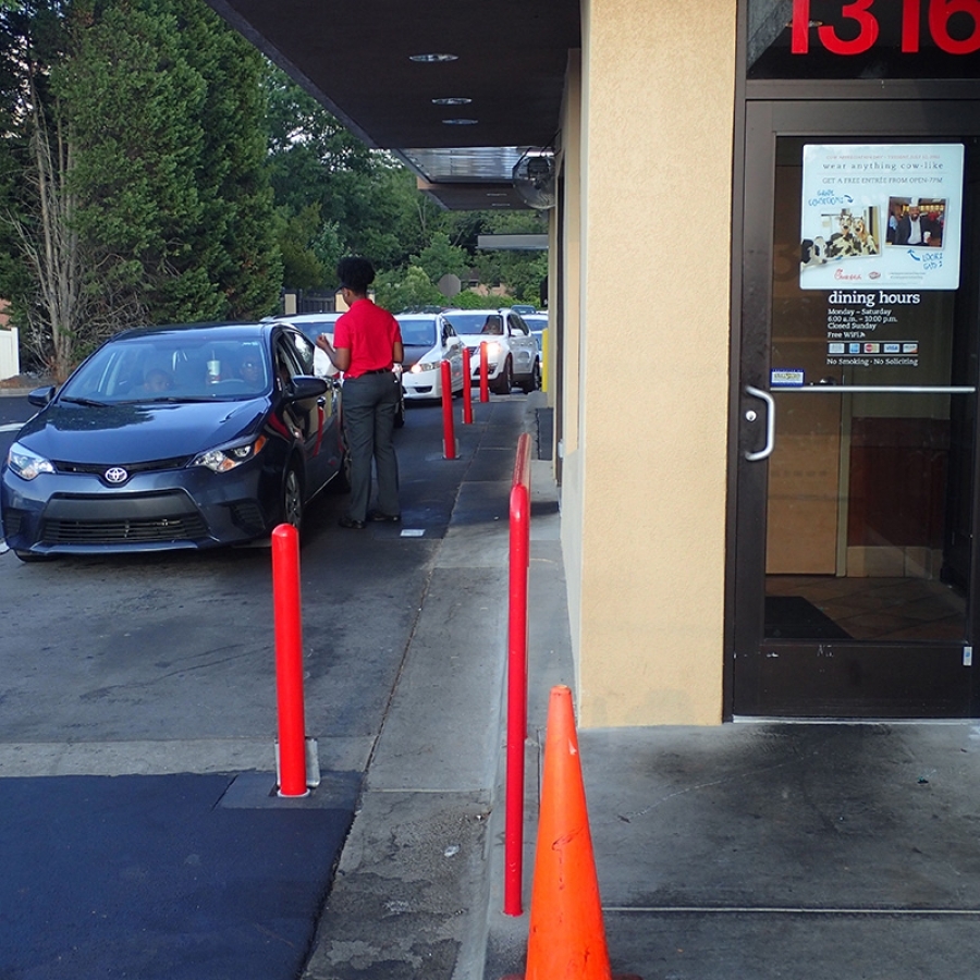 Bollards protecting a retail storefront entrance