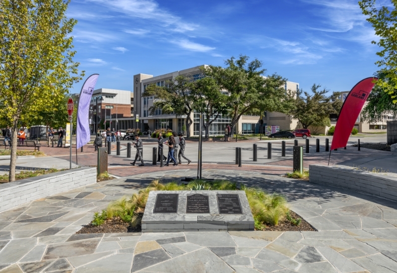 Bollards at a busy commercial plaza entrance